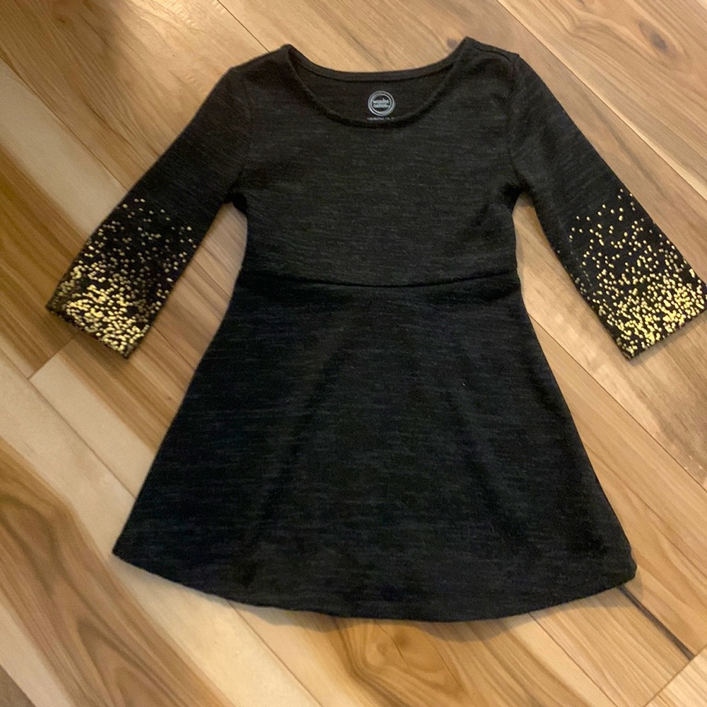 XS 4-5 size black cloth dress with gold on the sleeves.